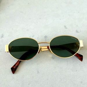 Celine Triomphe Metal Sunglasses, gold frame with green lens.